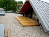 Dwa tarasy drewniane na  dachu. Realizacja pod Zieloną Górą.